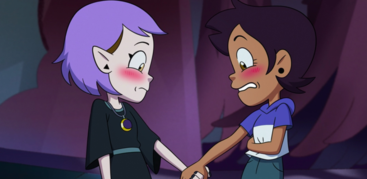Luz and Amity hold hands on The Owl House