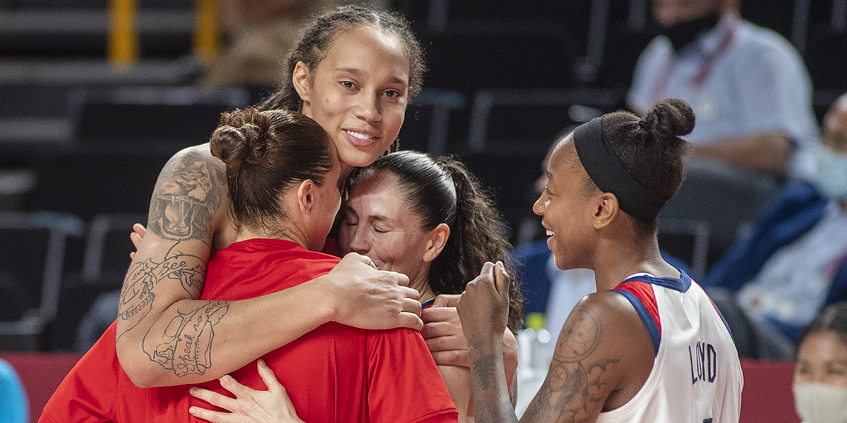 Brittney Griner hugs her Team USA teammates
