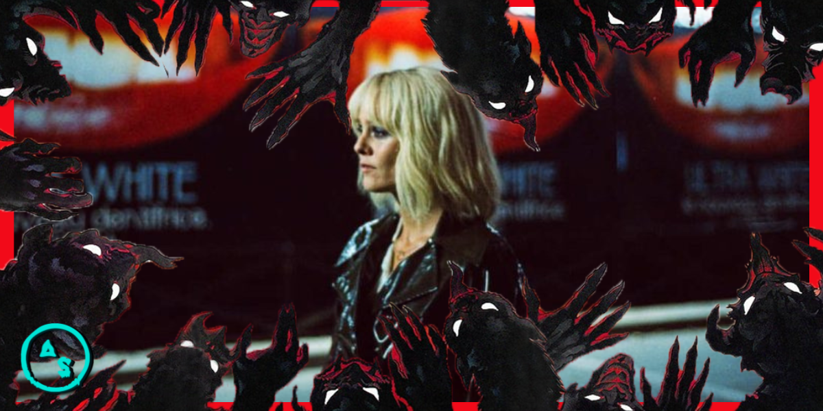 Anne in Knife+Heart wears a black vinyl trenchcoat