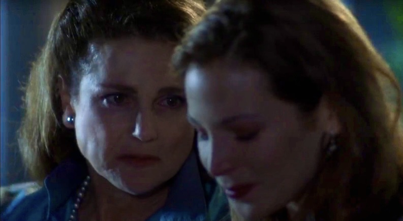 Jessica Stein comes out to an older woman, they are both covered in the dark of night