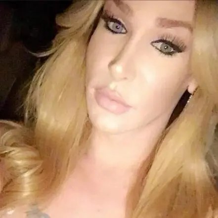 Close-up photo of Kelly Loving, a white woman with long blonde hair
