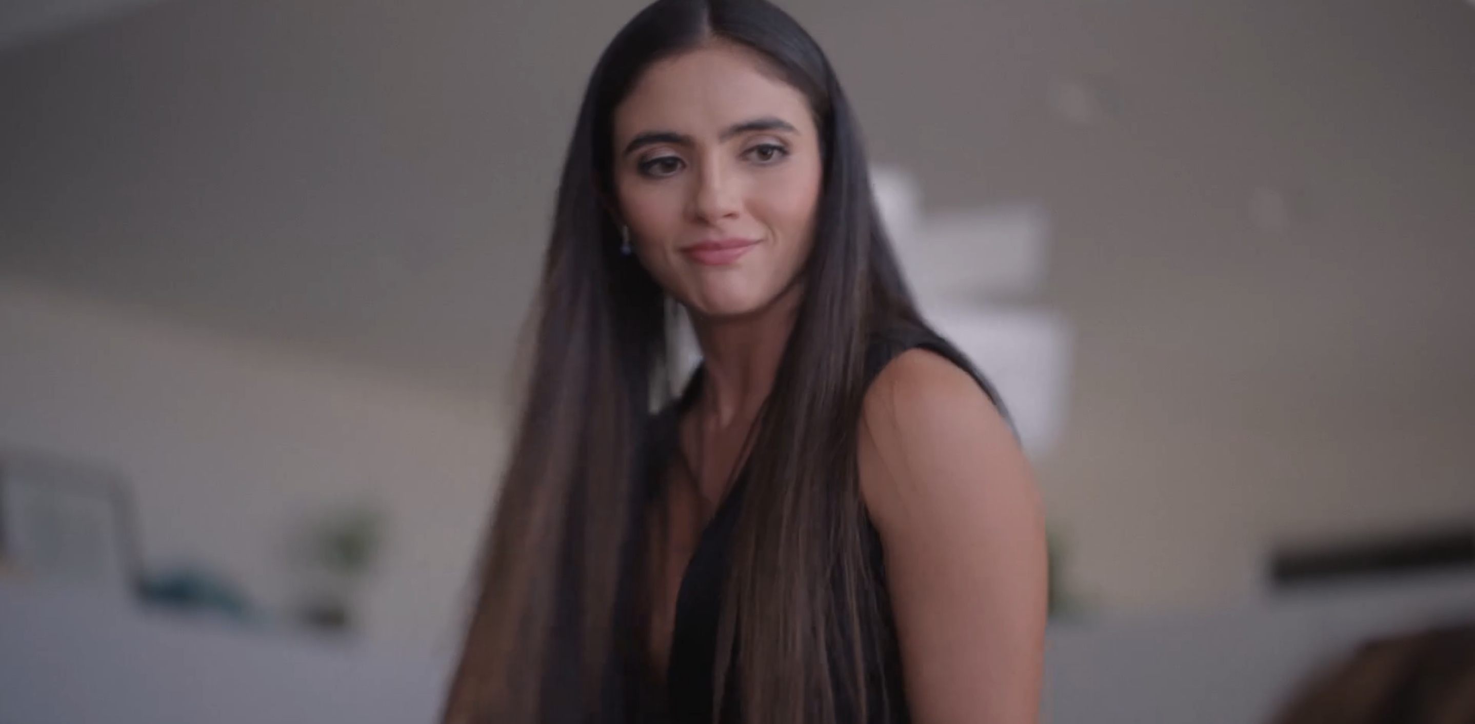 Dani looking down at Gigi