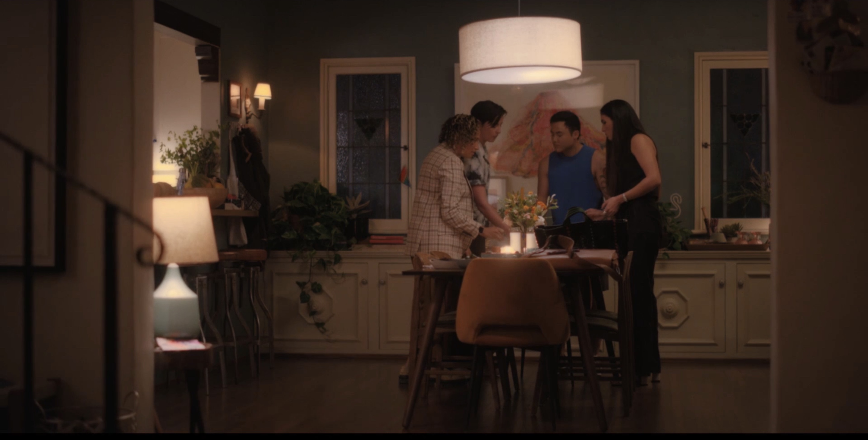 sohpie, micah, finley and dani gather around the table