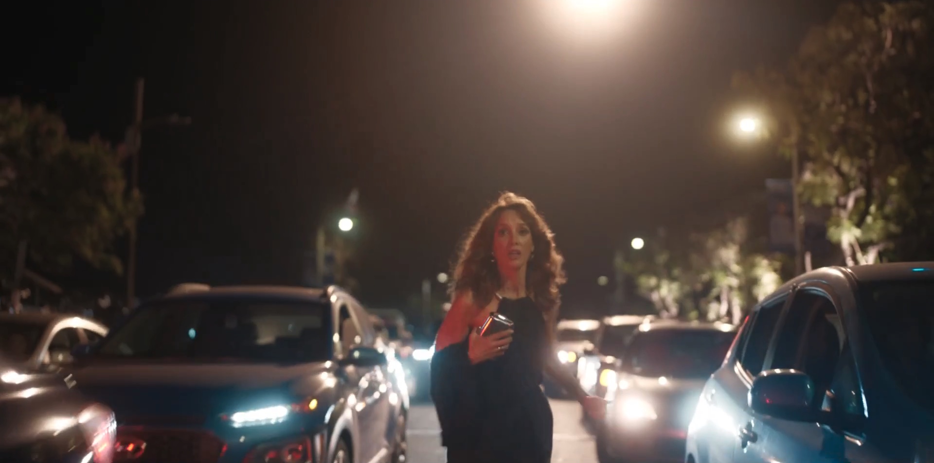 Bette running through traffic