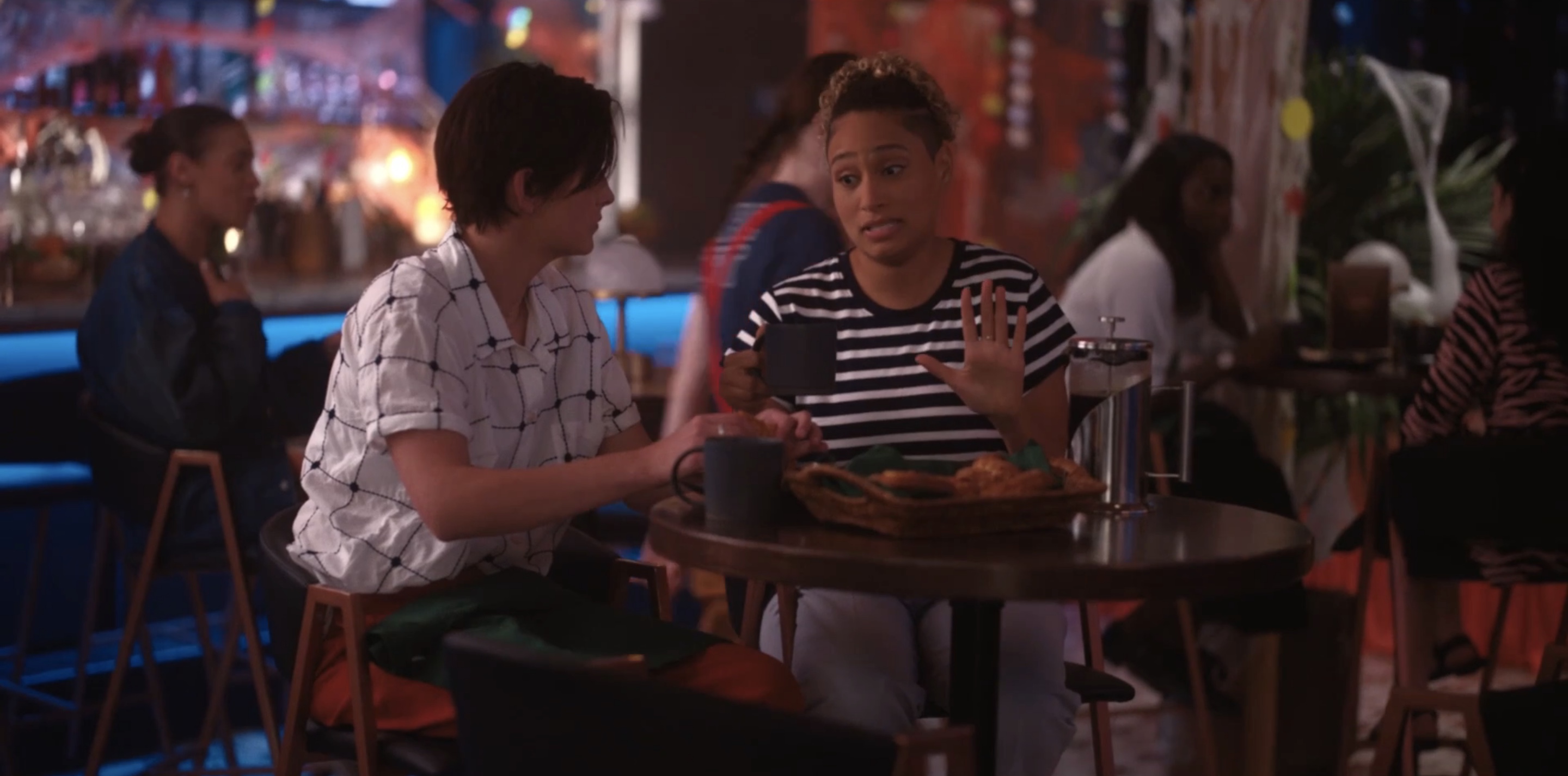 Sophie and Finley sitting at the table in Danas talking