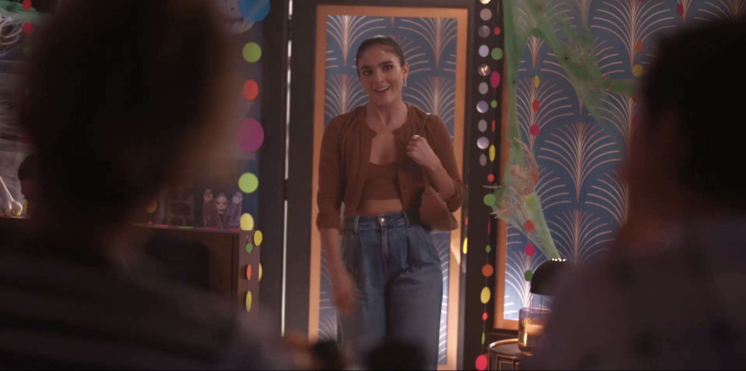Dani walking into Dana's looking joyful