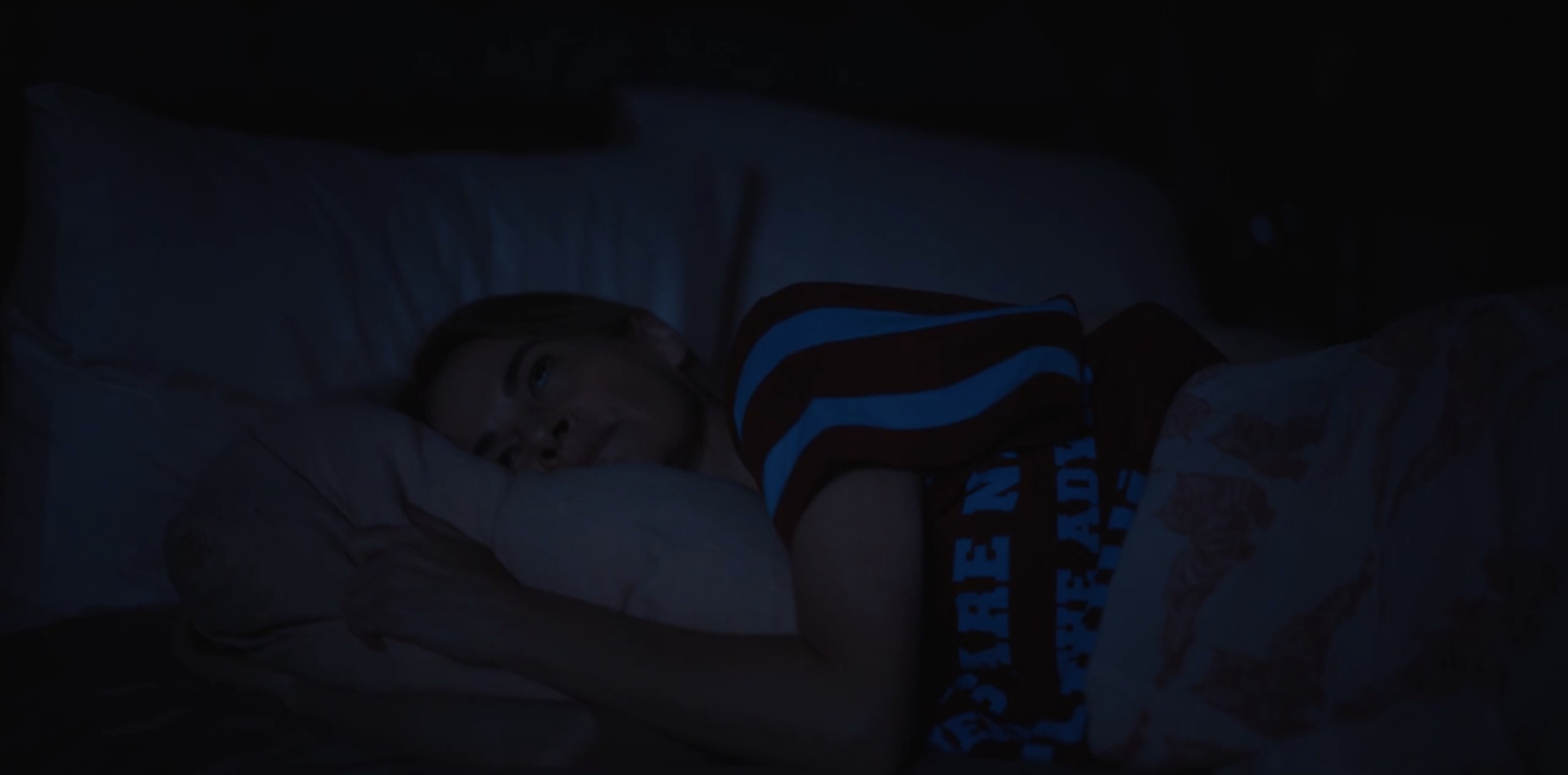Alice lying in bed
