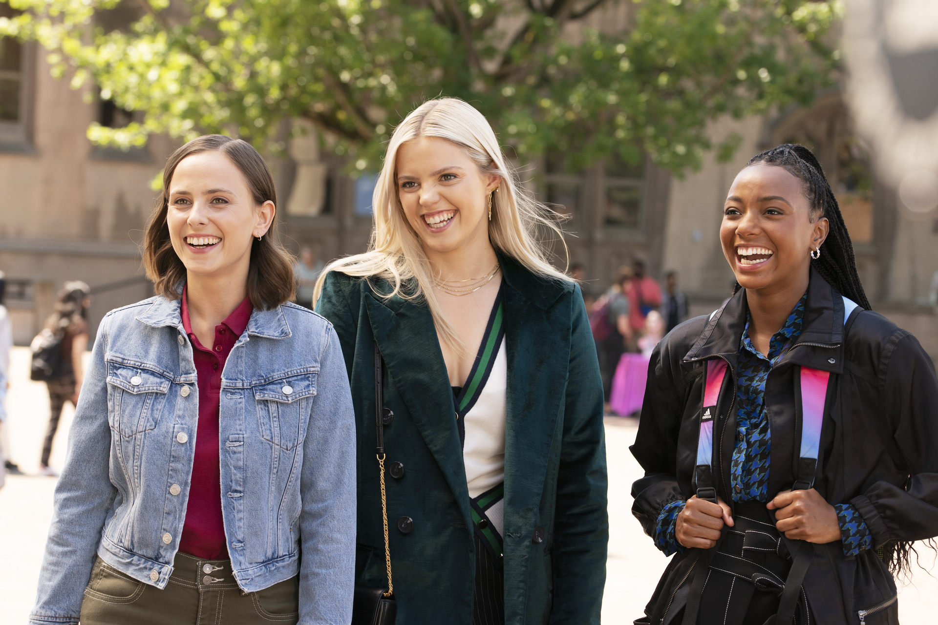 The girls on campus laughing