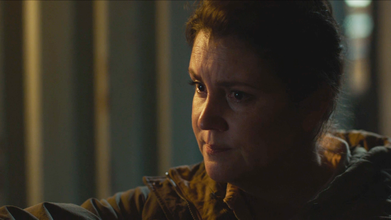The Last of Us: a close-up of Melanie Lynskey as Kathleen, she looks disappointed