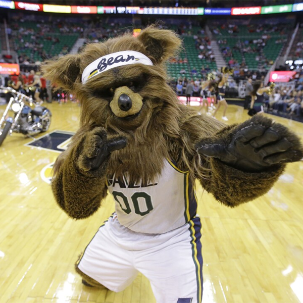 Jazz Bear in a Utah Jazz uniform, kinda dancing menacingly