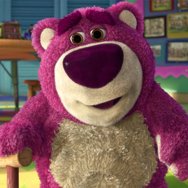 Lots-o'-Huggin' Bear, dirty and purple and smiling menacingly