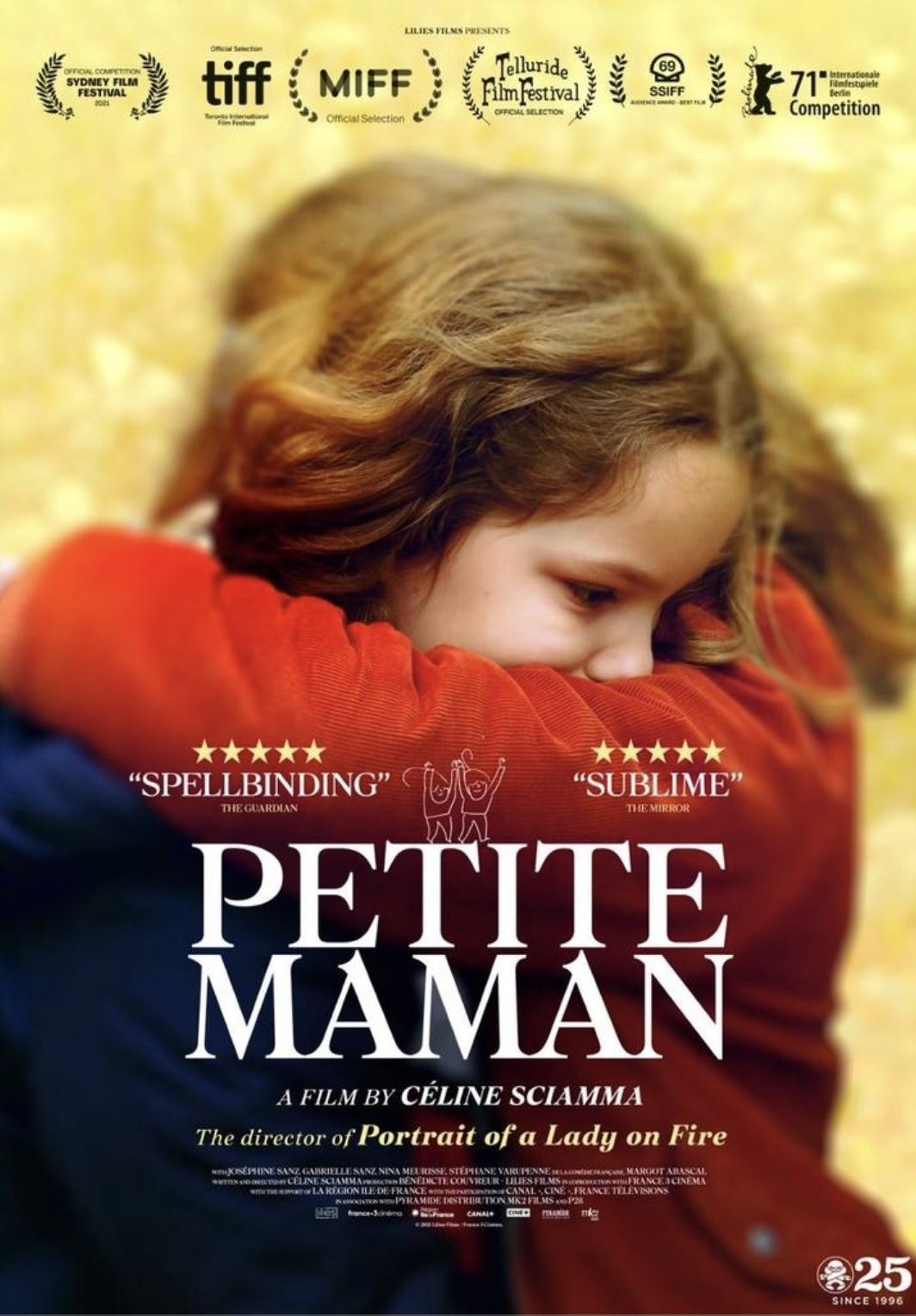 the cover of petite maman features two children embracing