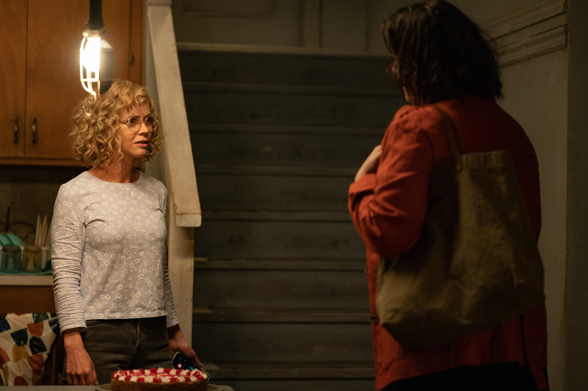 Yellowjackets Christina Ricci as Misty in YELLOWJACKETS talks to Shauna in a basement. Season 2. Photo Credit: Kimberley French/SHOWTIME.