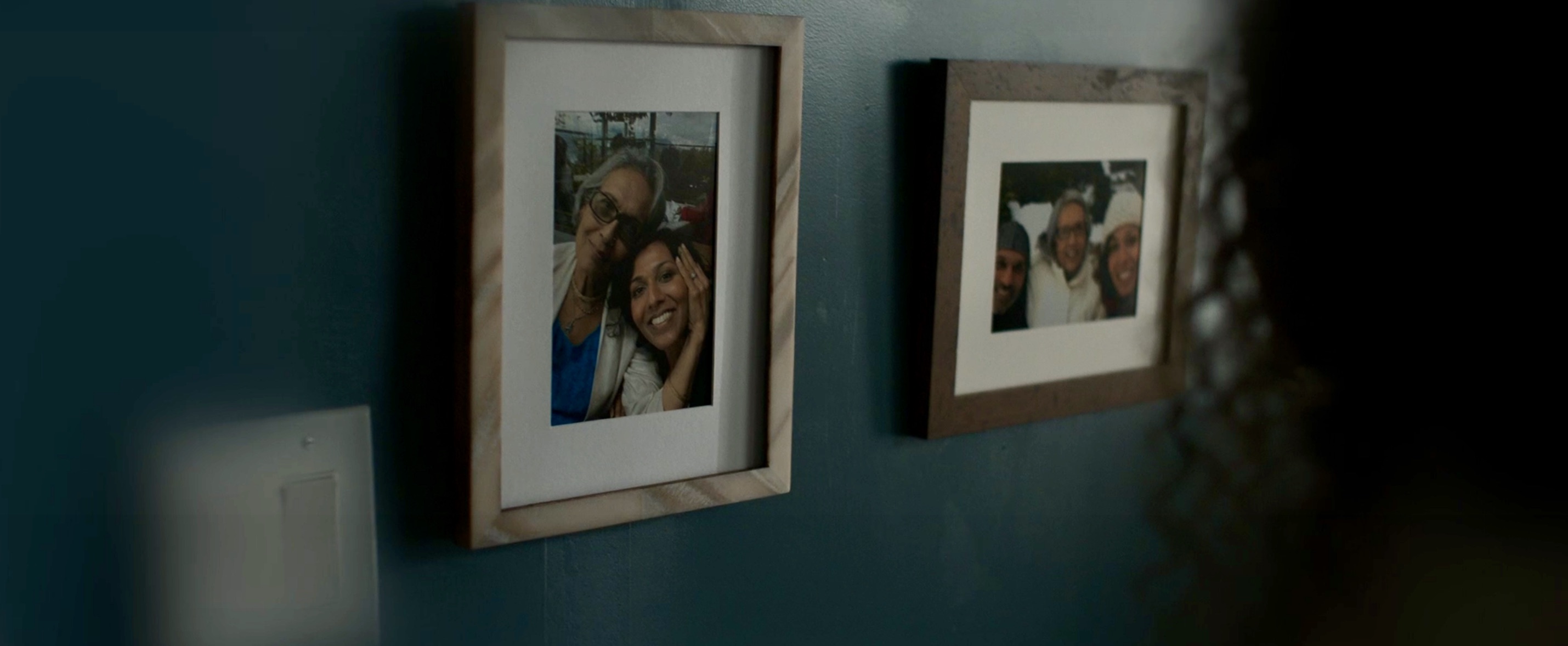a framed photo of Jessica Roberts and an unspecified woman