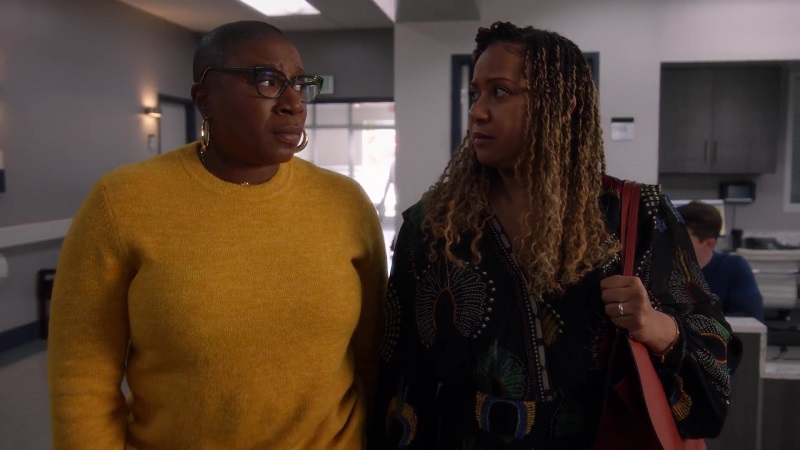 Hen (L) and Karen (R) share a worried glance as their son goes to meet with his biological father.