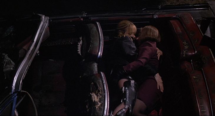 two women having sex in a car in Crash