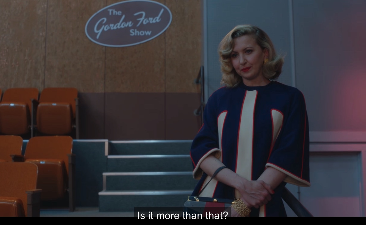 Hedy looking at Susie asking "Is it more than that?"