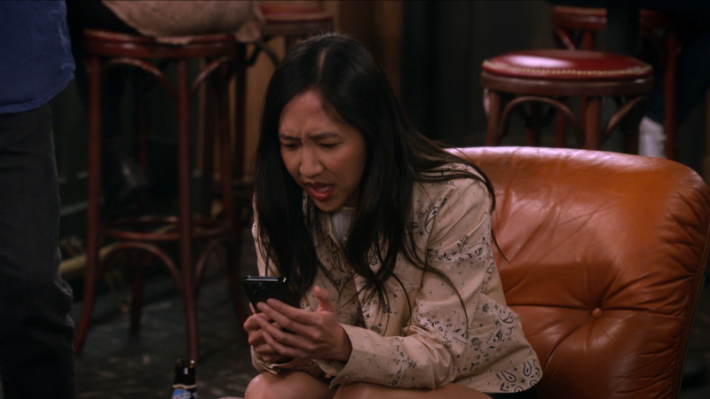 How I Met Your Father: Ellen staring at her phone in disgust