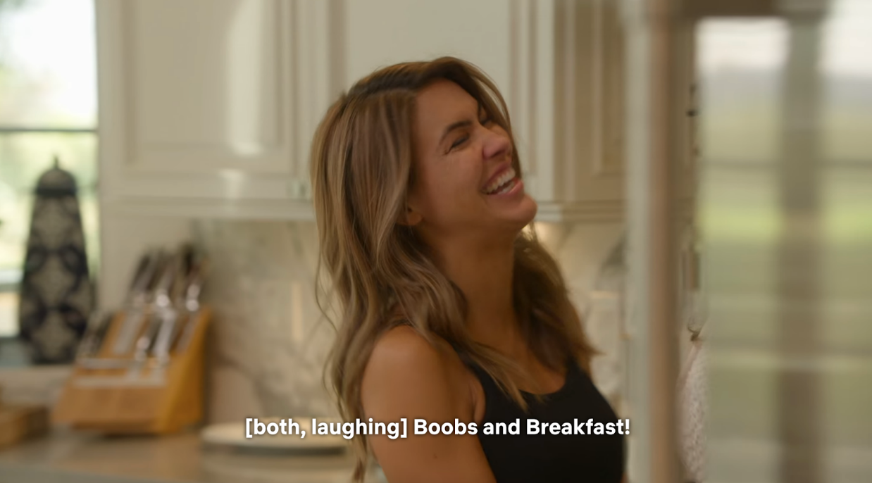 Chrishell laughing on Selling Sunset season six and saying "Boobs and Breakfast!"