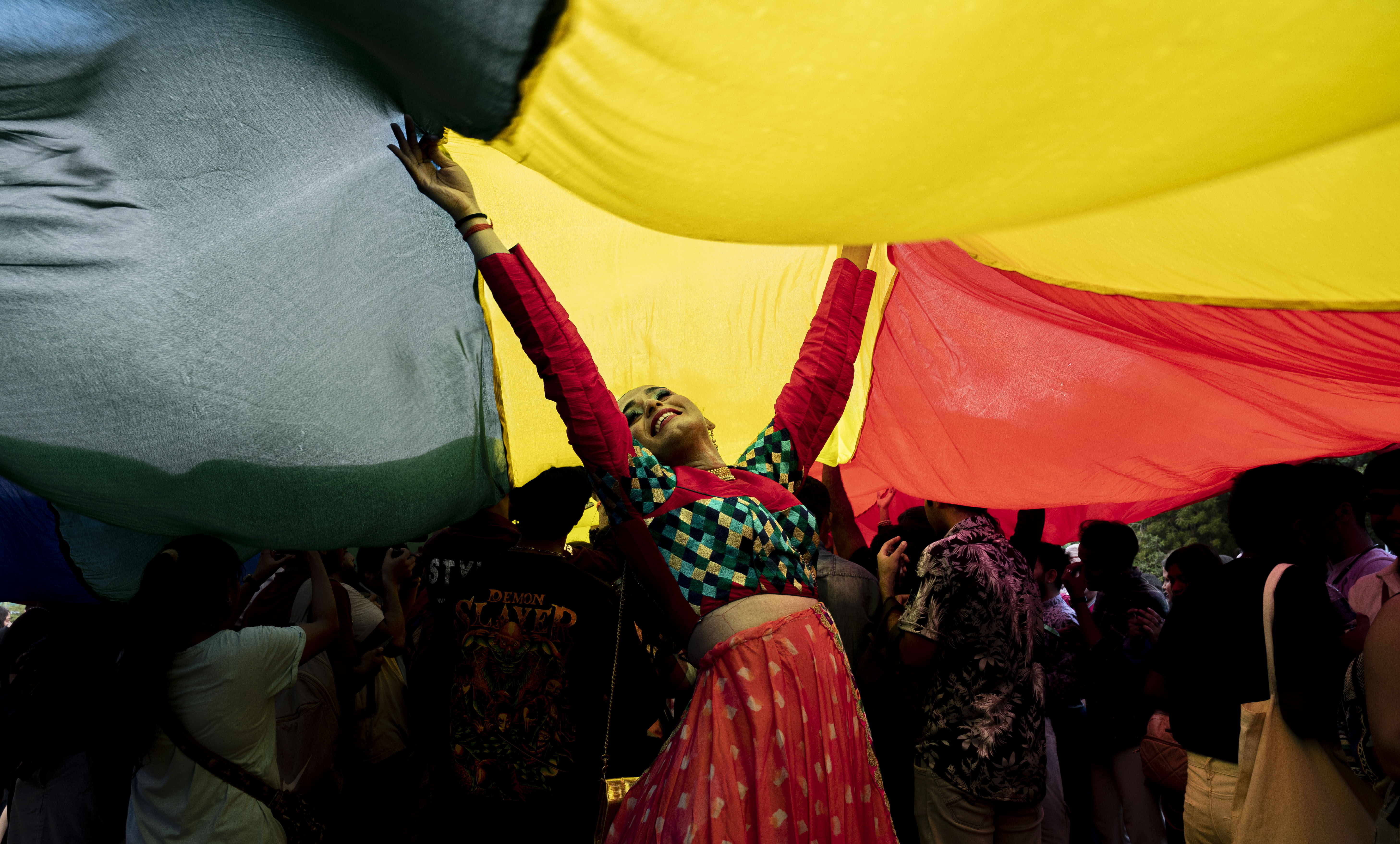 MUMBAI, INDIA JUNE 24: Members of LGBTQ community dances during a pride parade celebrating lesbian, gay, bisexual, transgender, and queer (LGBTQ) social and self-acceptance, achievements, legal rights, and pride, at Azaid Maidan, CSMT, on June 24, 2023 in Mumbai, India. (Photo by Anshuman Poyrekar/Hindustan Times via Getty Images)