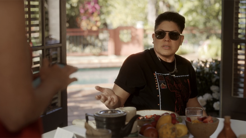 Che Diaz wearing sunglasses inside.