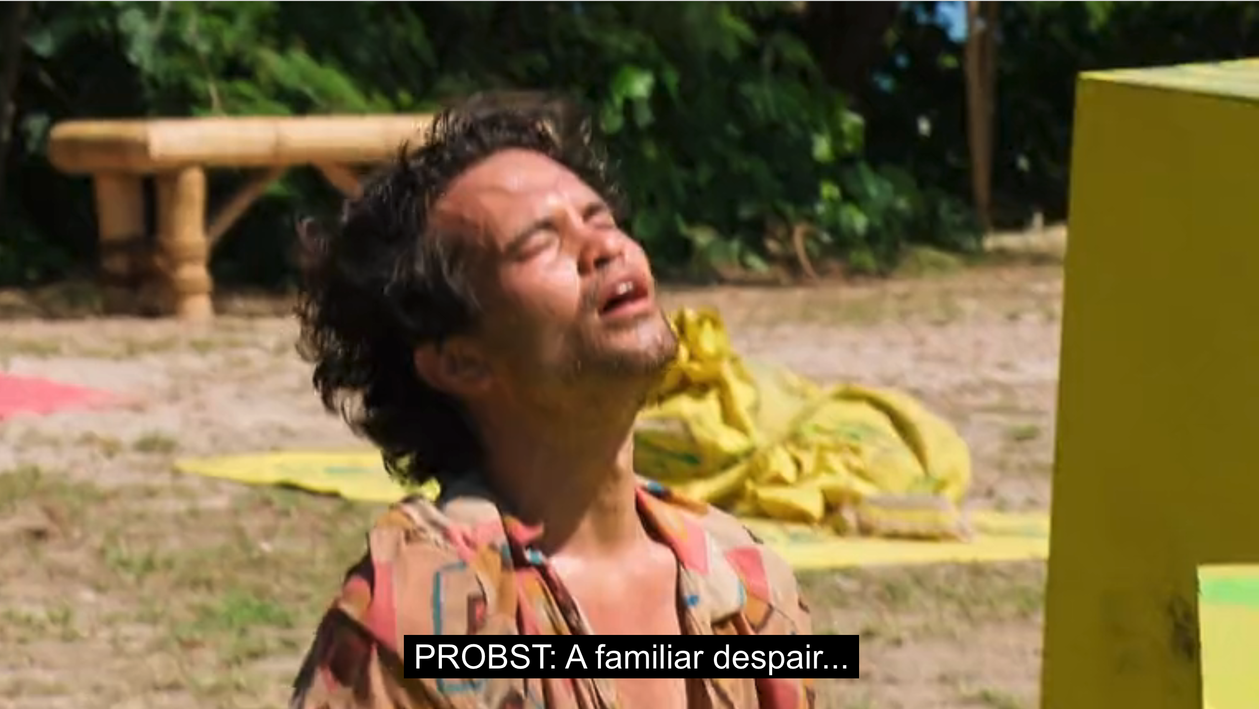 Survivor Season 45 contestant Sean Edwards closes his eyes and leans heavenward, a look of utter anguish on his face