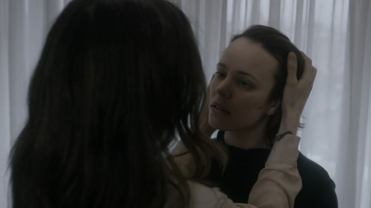 Disobedience sex scene: Ronit runs her fingers through Esti's hair.
