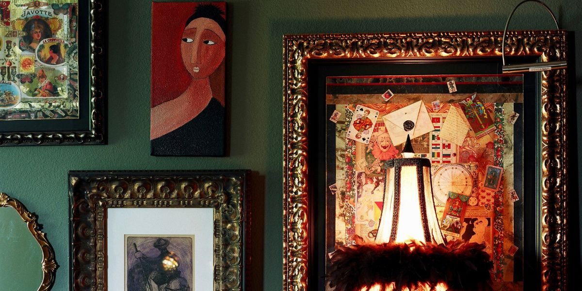 a wall covered in framed art