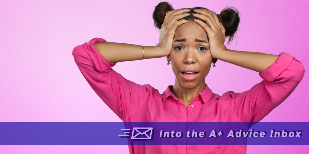 a photo of a stressed out looking Black woman against a pink background. she has her hands on her head like 