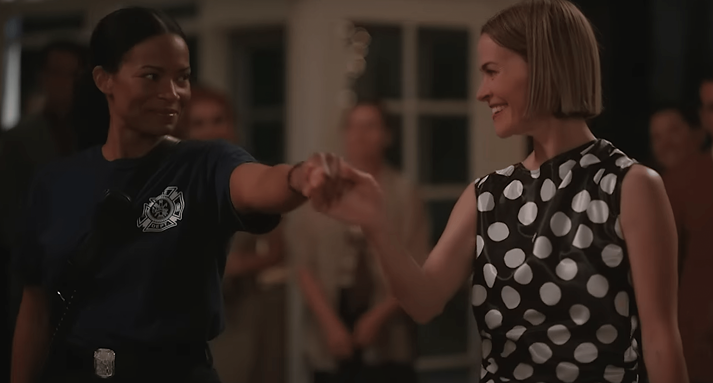 Best queer TV scenes of 2023: Alice in a black and white polka dot dress dances with Tasha dressed as a fire fighter