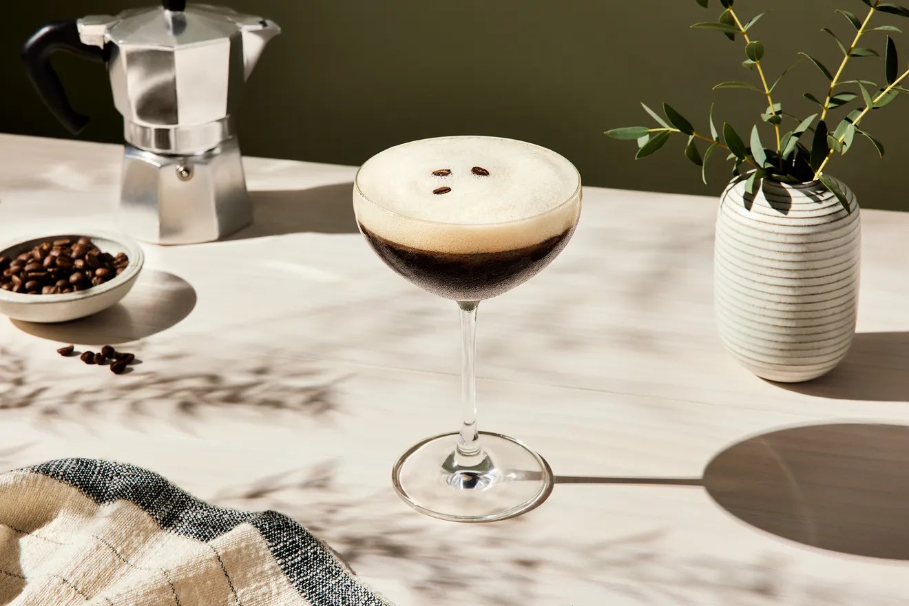 A martini glass full of Non-Alcoholic Espresso Martini