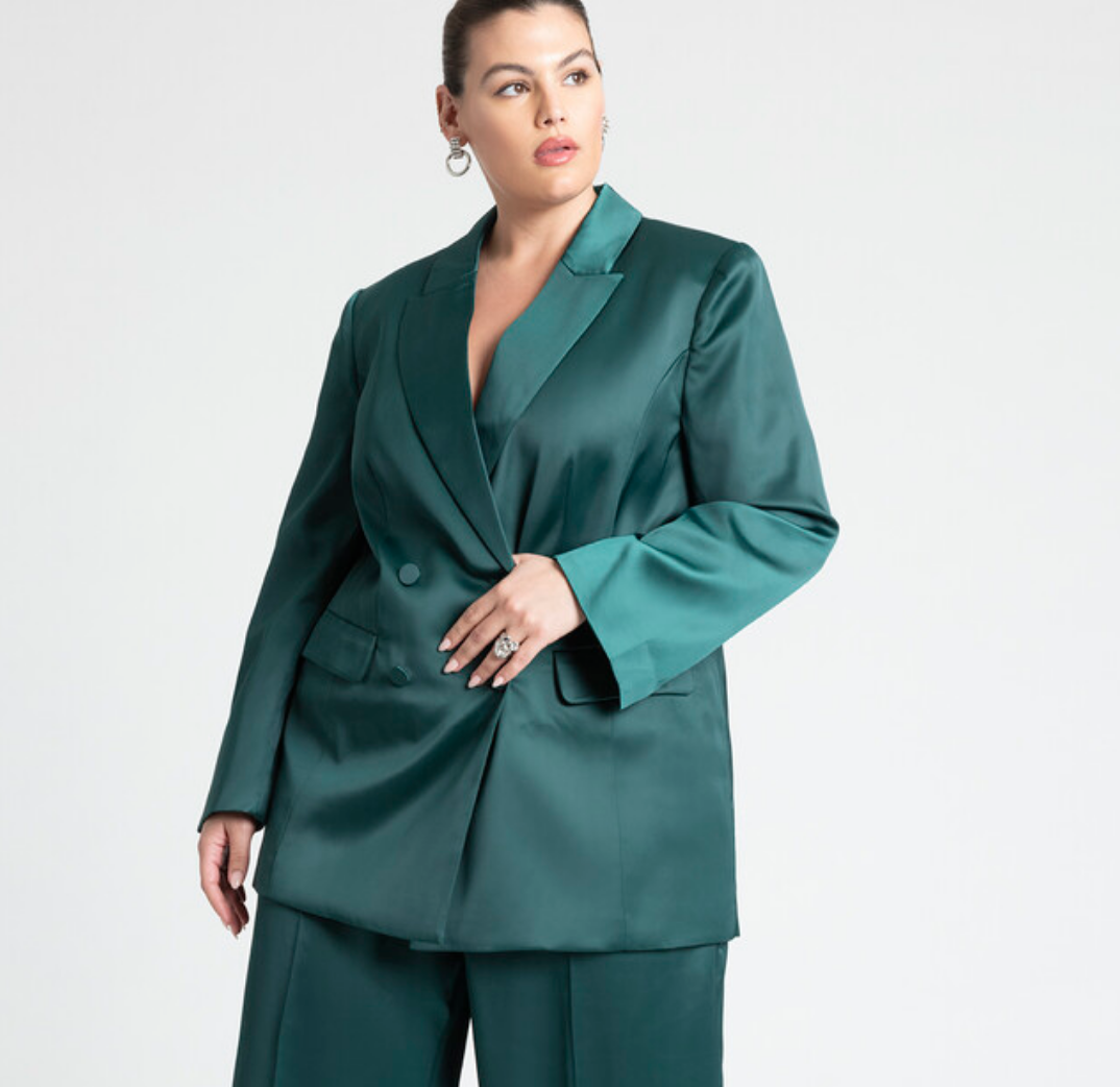 plus size wedding guest inspiration: a plus size teal colored double breasted blazer
