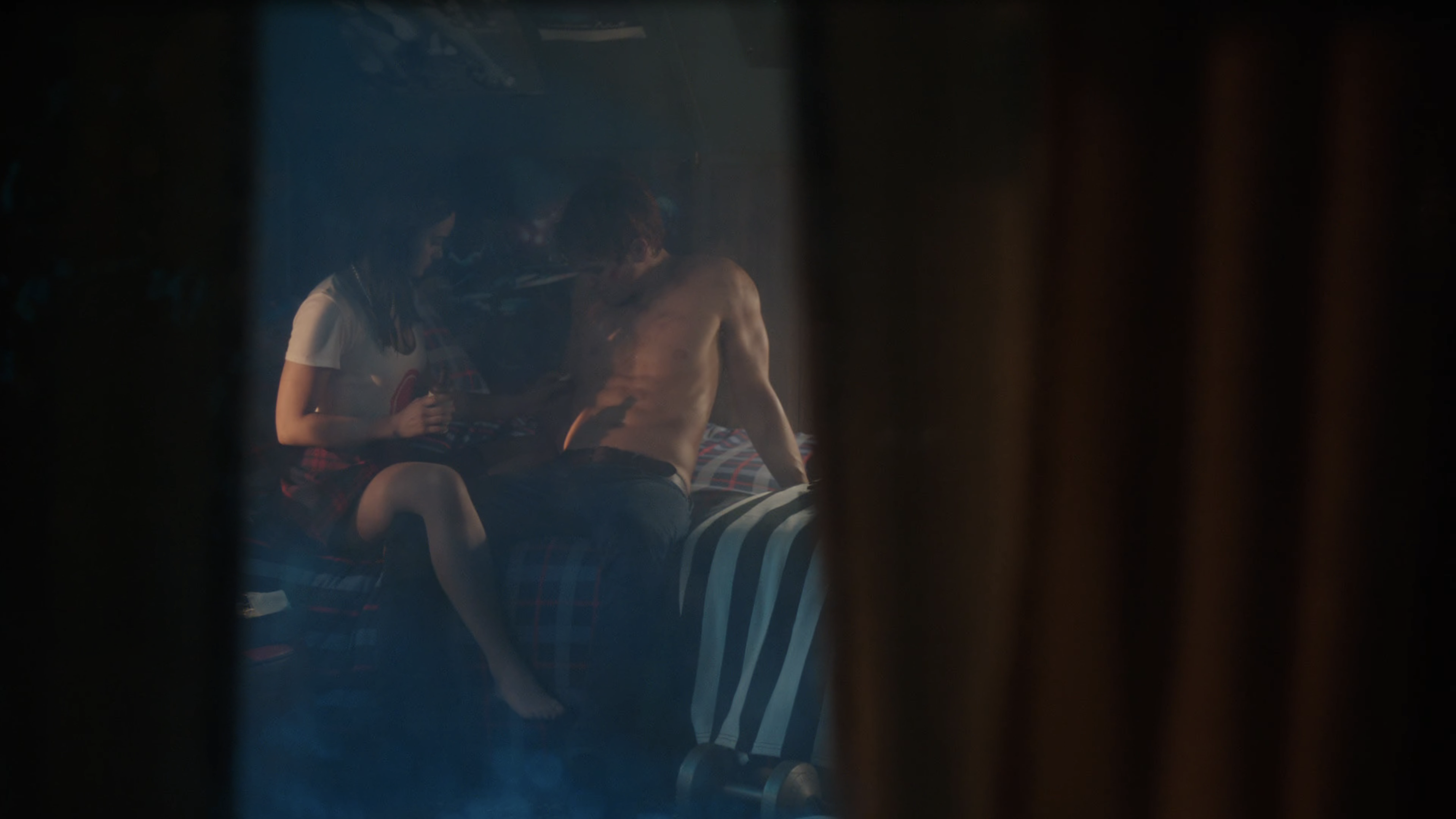 Veronica dabs at Archie's wounded stomach.