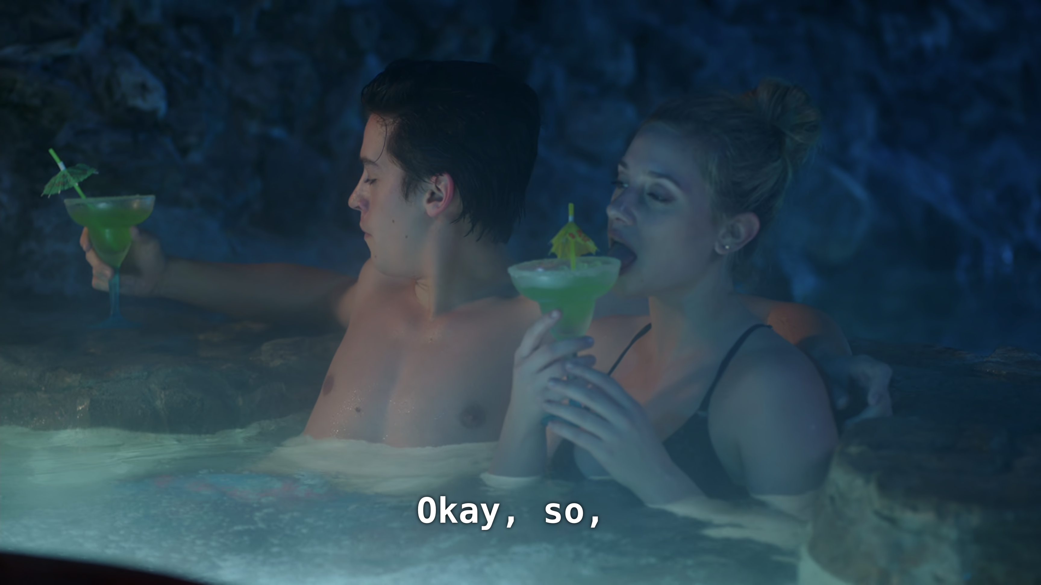 Betty sits next to Jughead in a hot tub and licks the rim of a margarita glass. CC: Okay, so,