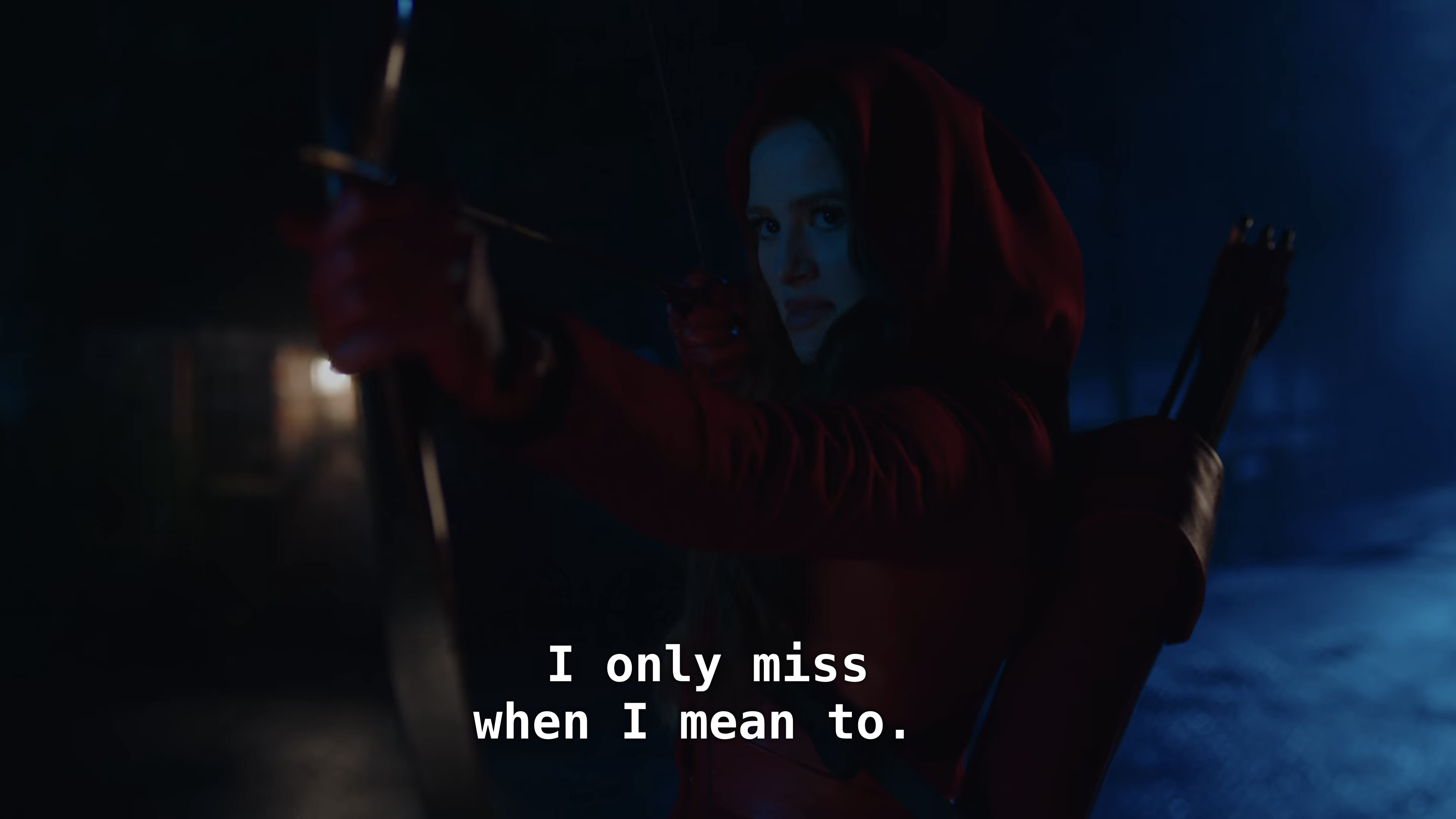 Cheryl in a red hood holds up a bow and arrow. "I only miss when I mean to."