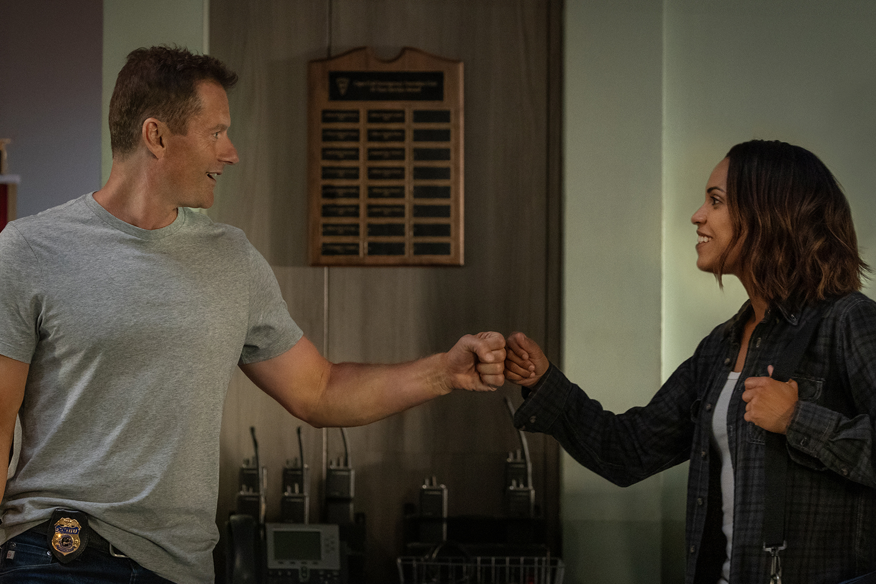 Hightown Season three - James Badge Dale fist bumps Monica Raymund