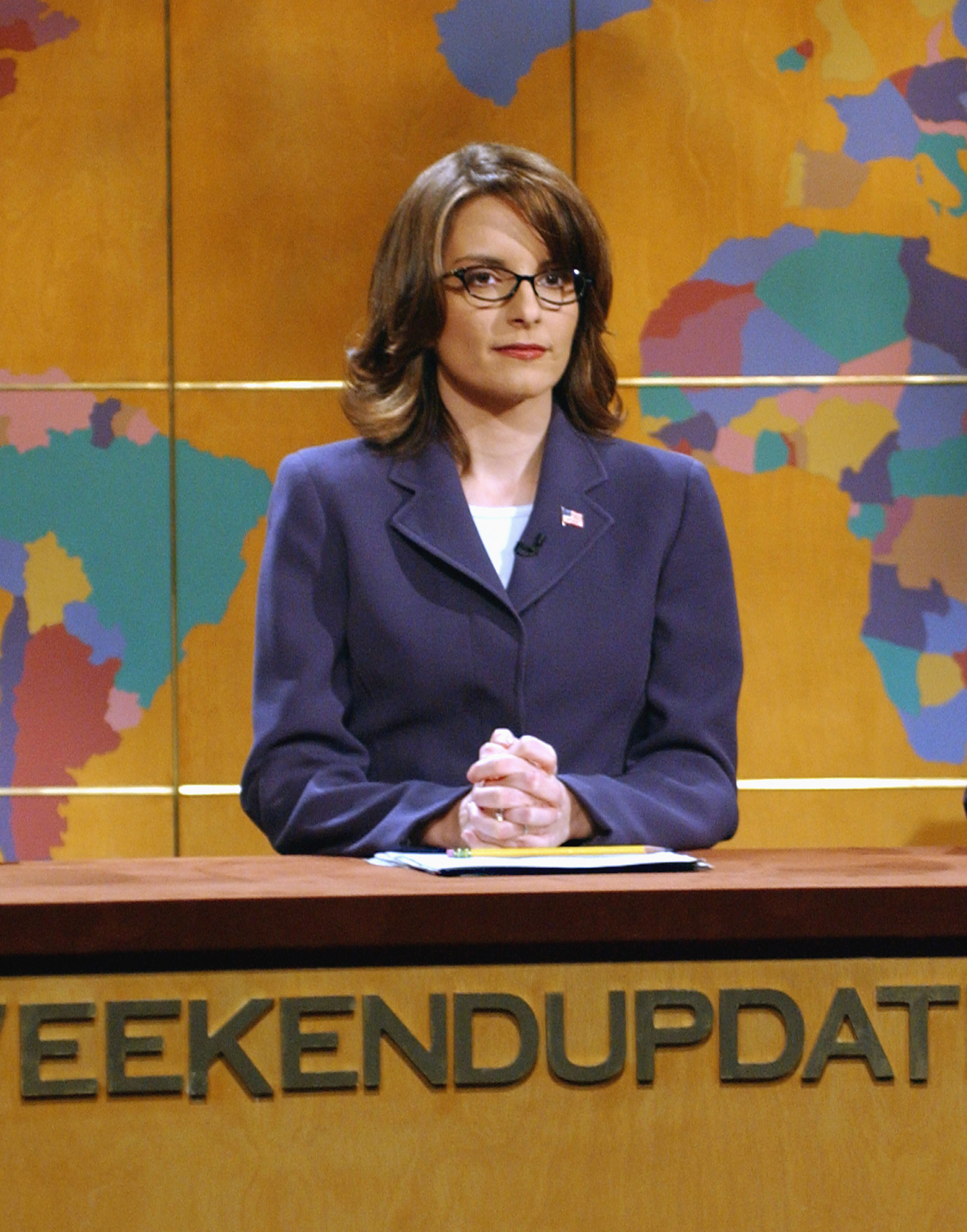 SATURDAY NIGHT LIVE -- Episode 6 -- Air Date 11/17/2001 -- Pictured: Tina Fey during "Weekend Update" on Novemeber 17, 2001