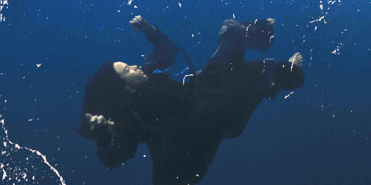 Billie Eilish floating in water