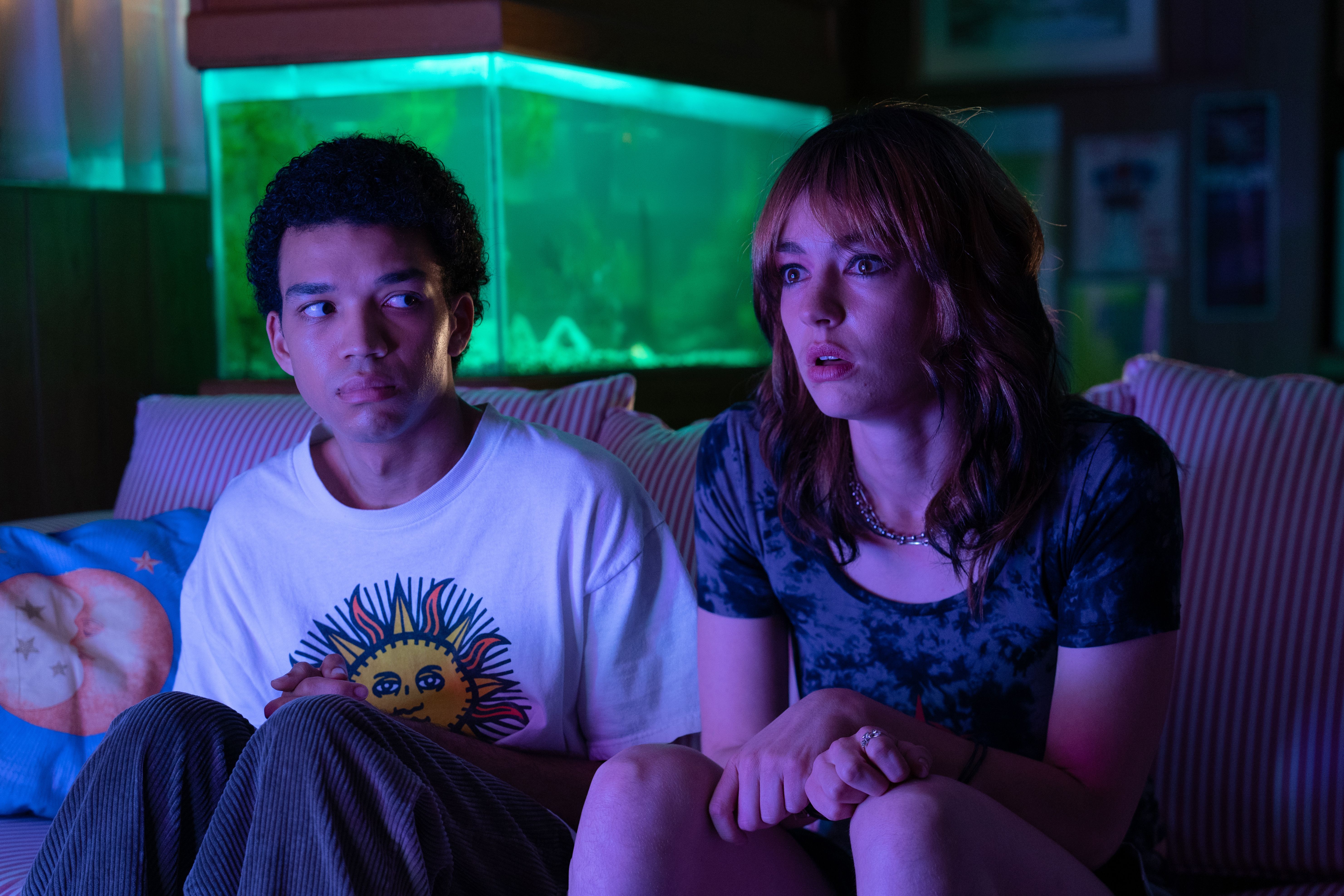 Brigette Lundy-Paine interview: Justice Smith sits on a couch next to Brigette Lundy Paine