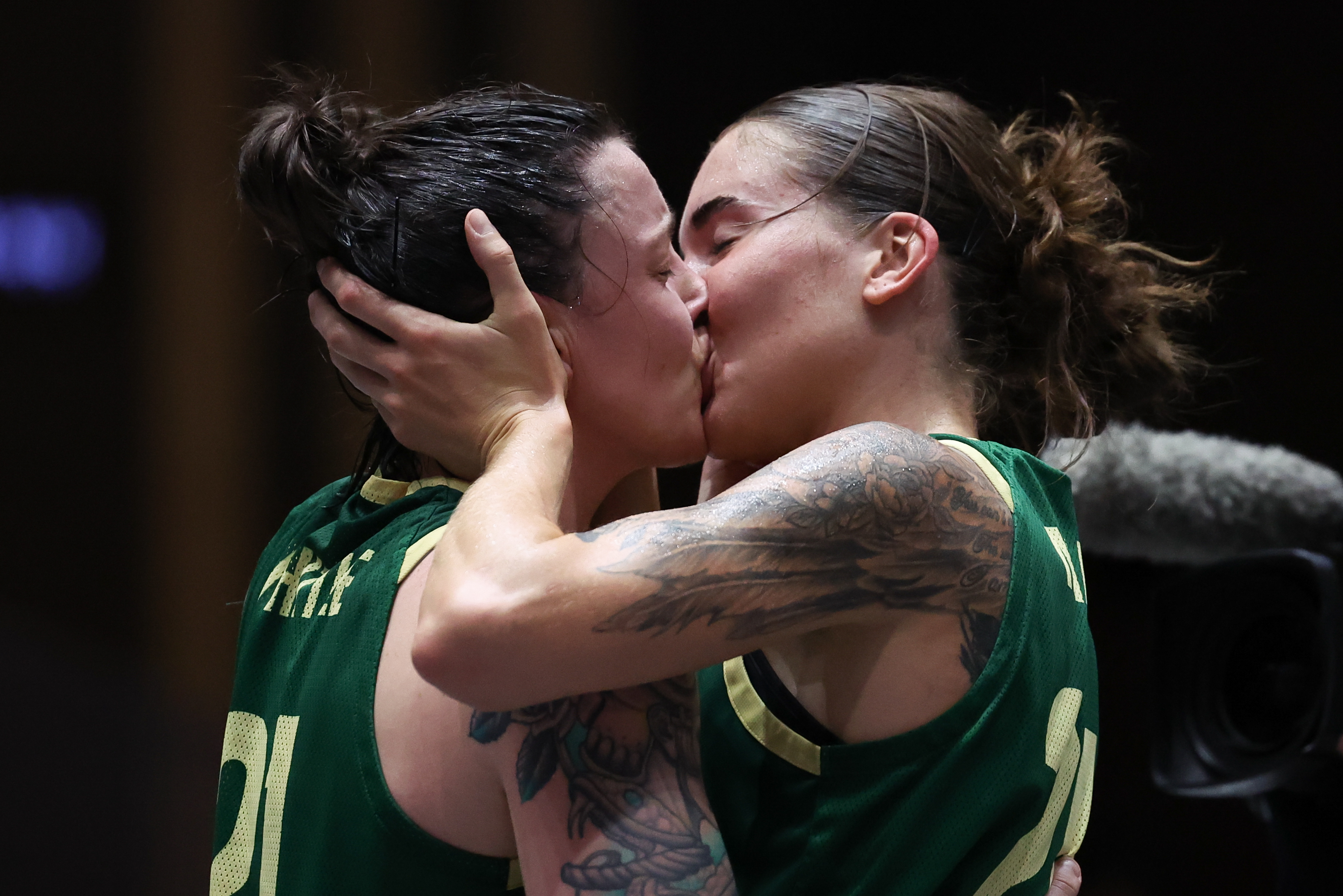 UTSUNOMIYA, JAPAN - MAY 05: Marena Whittle #21 and Anneli Maley #24 of Australia celebrates the victory after the Women’s Final match between Australia and Canada on day three of the FIBA 3x3 Olympic Qualifying Tournament 2 at Light Cube Utsunomiya on May 05, 2024 in Utsunomiya, Tochigi, Japan. (Photo by Takashi Aoyama/Getty Images)