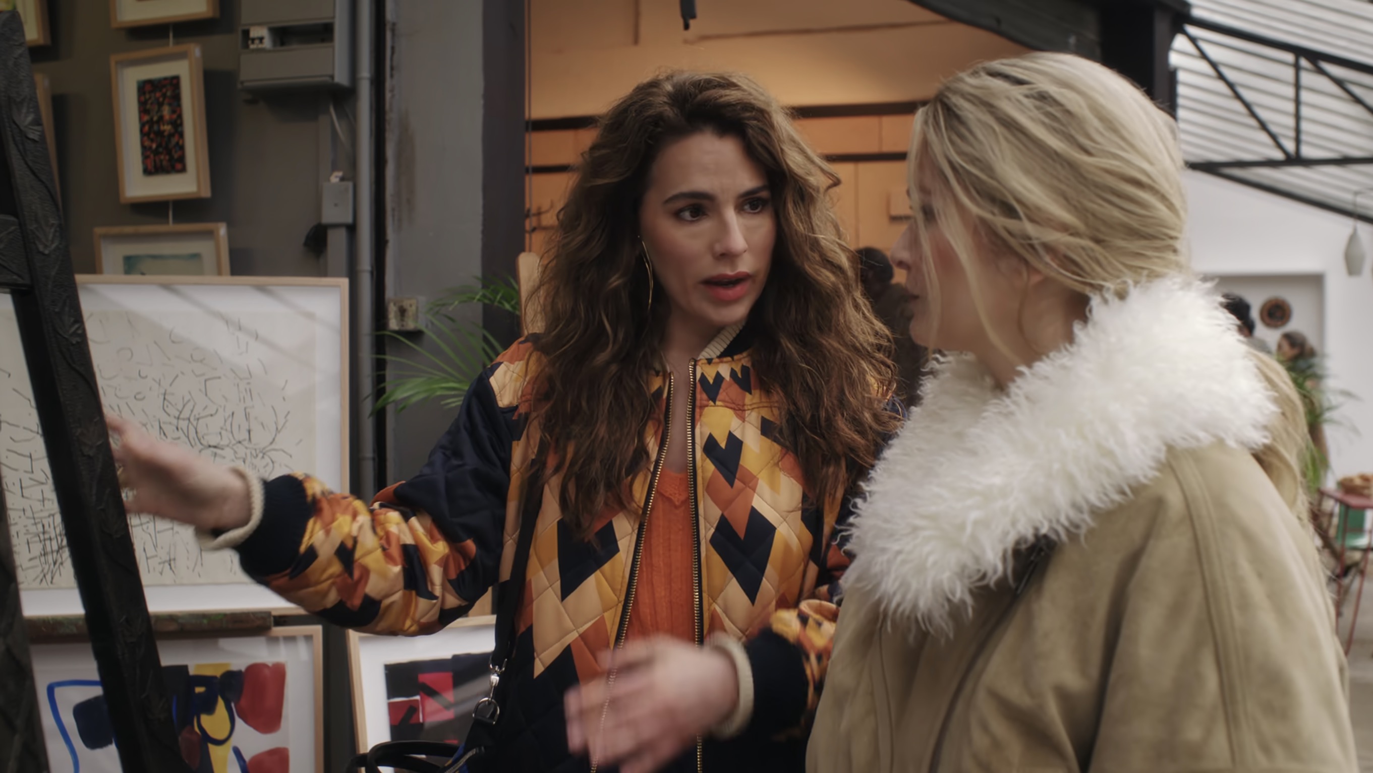 Sofia showing Camille an easel
