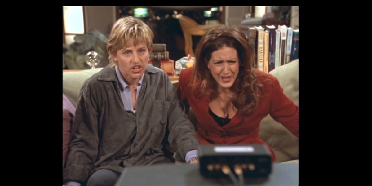 Rainbow Age of Television: A still from Ellen of Ellen Degeneres and Joely Fisher looking upset as they watch TV