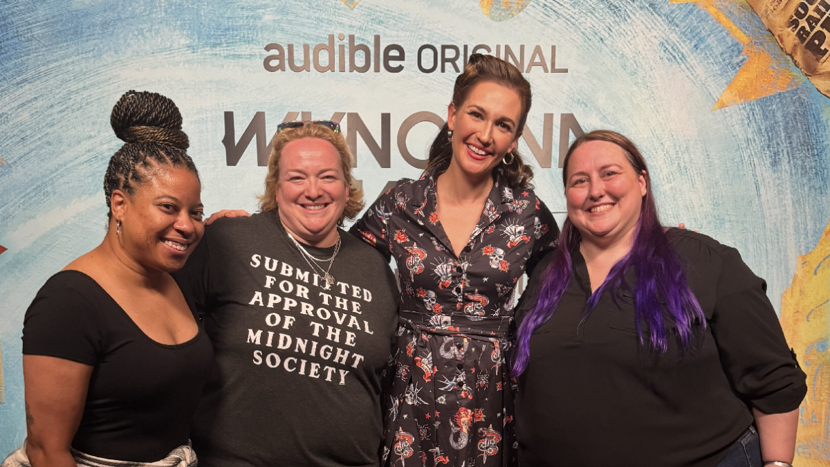 Autostraddle Writers Nic and Valerie with their friend (also named Nic) and actress Kat Barrell at an Audible fan party