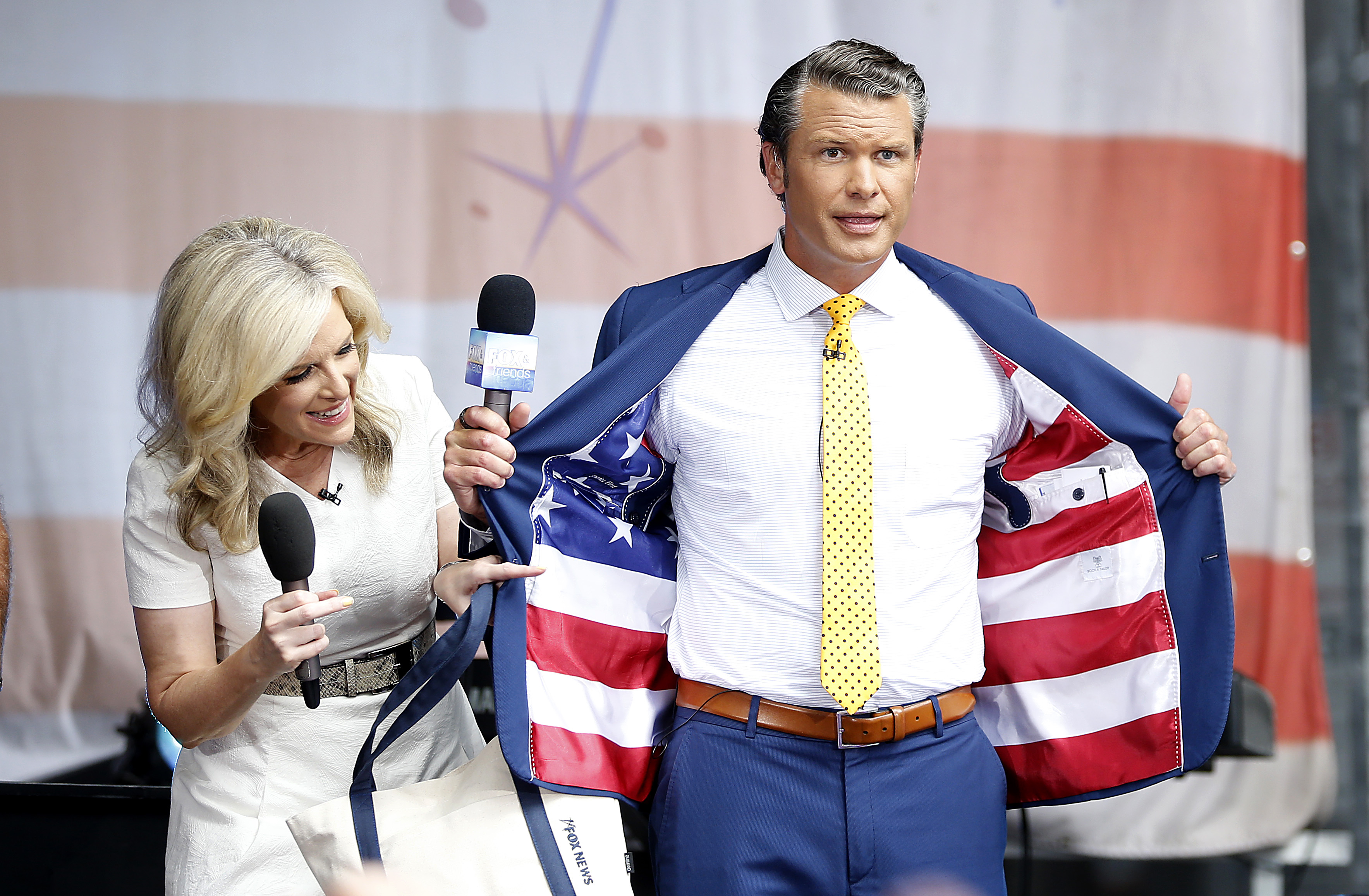 NEW YORK, NEW YORK - JULY 19: FOX anchor Pete Hegseth and meteorologist Janice Dean are on stage as Phil Vassar performs on "FOX & Friends" All-American Summer Concert Series on July 19, 2019 in New York City. (Photo by John Lamparski/Getty Images)