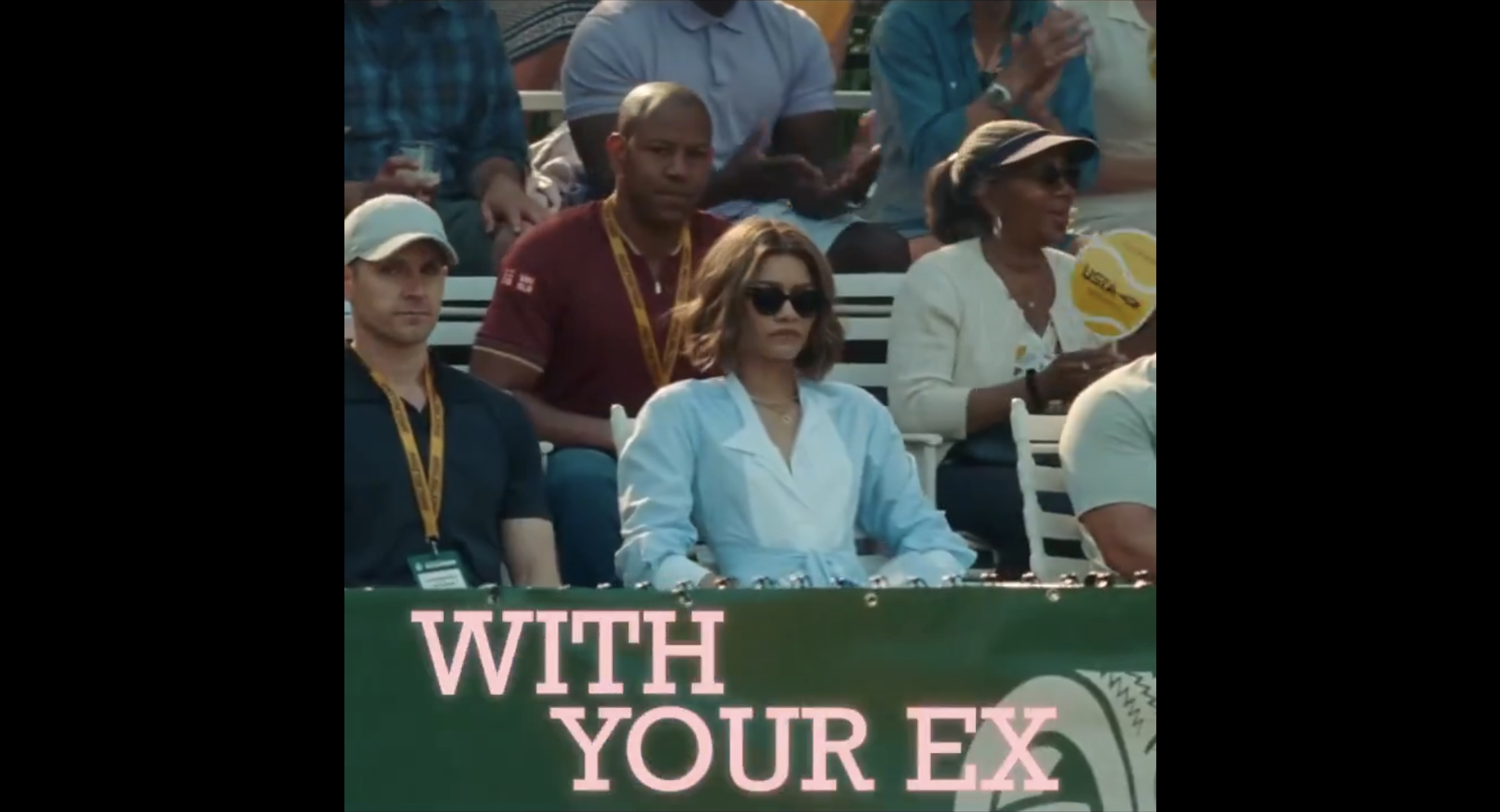 A screenshot from a Challengers edit. Zendaya in the stands with WITH YOUR EX written below her