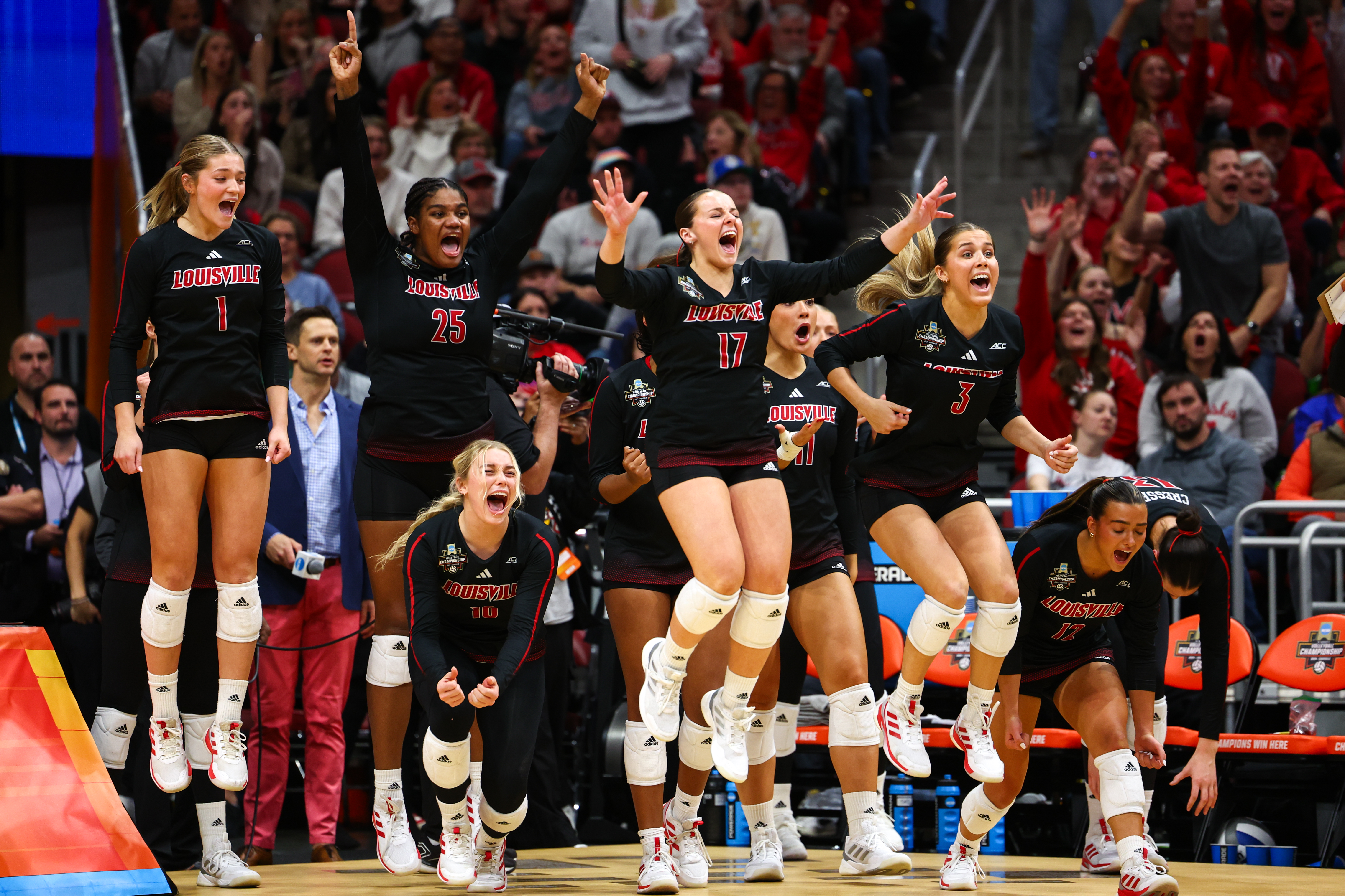LOUISVILLE, KENTUCKY - DECEMBER 19: The Louisville Cardinals celebrate after defeating the Pittsburgh Panthers during the Division I Women's Volleyball Semifinals held at the KFC YUM! Center on December 19, 2024 in Louisville, Kentucky. (Photo by Jamie Schwaberow/NCAA Photos via Getty Images)
