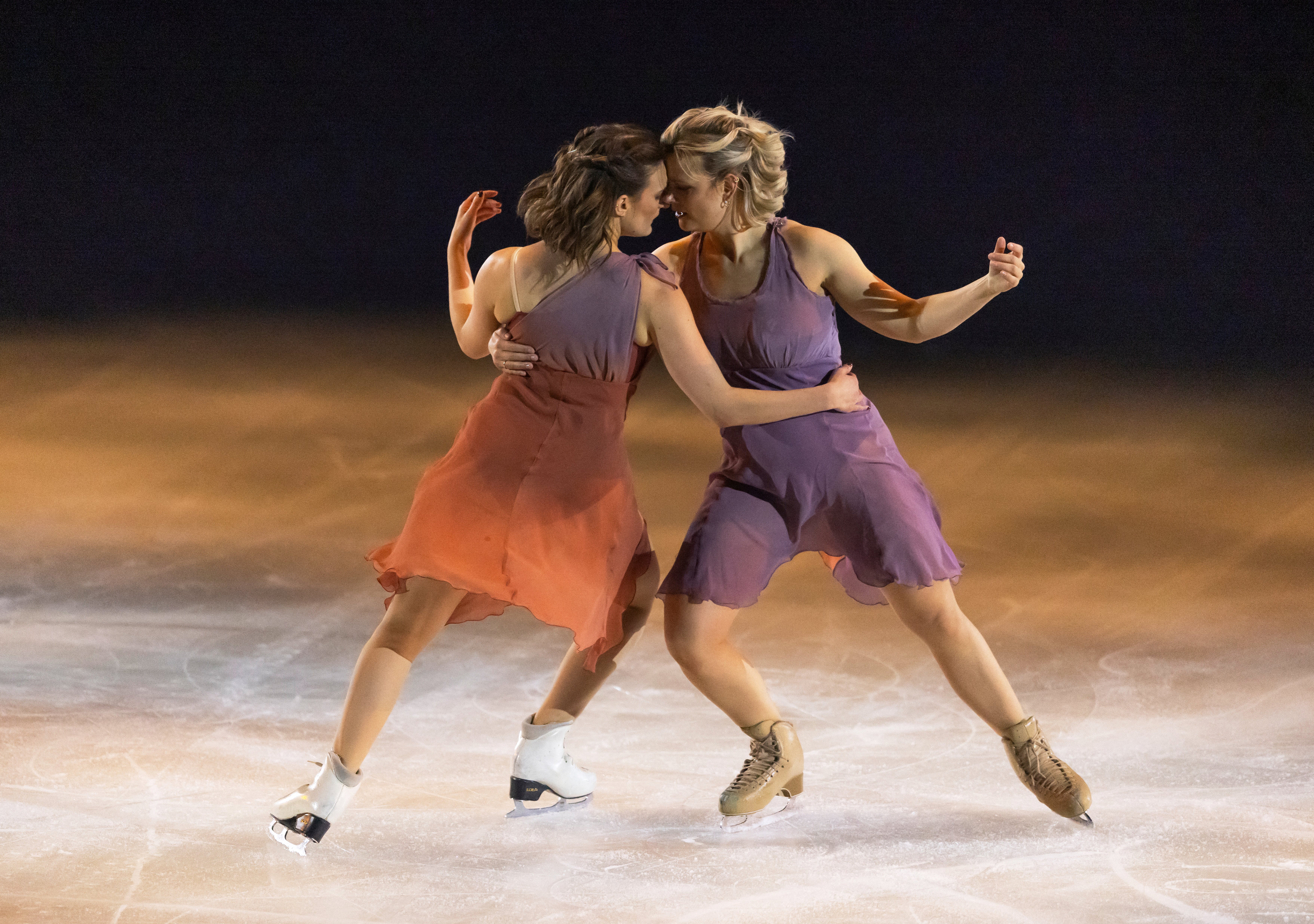 France's Gabriella Papadakis (L) and US' Madison Hubbell perfom during the "Art on Ice" figure skating gala in Zurich, on February 6, 2025. Olympic champions Gabriella Papadakis and Madison Hubbell on February 6, 2025, took to the ice at a figure skating gala in Zurich trying to "push the limit" of the sport as a first same-sex couple to skate together. (Photo by ARND WIEGMANN / AFP) (Photo by ARND WIEGMANN/AFP via Getty Images)