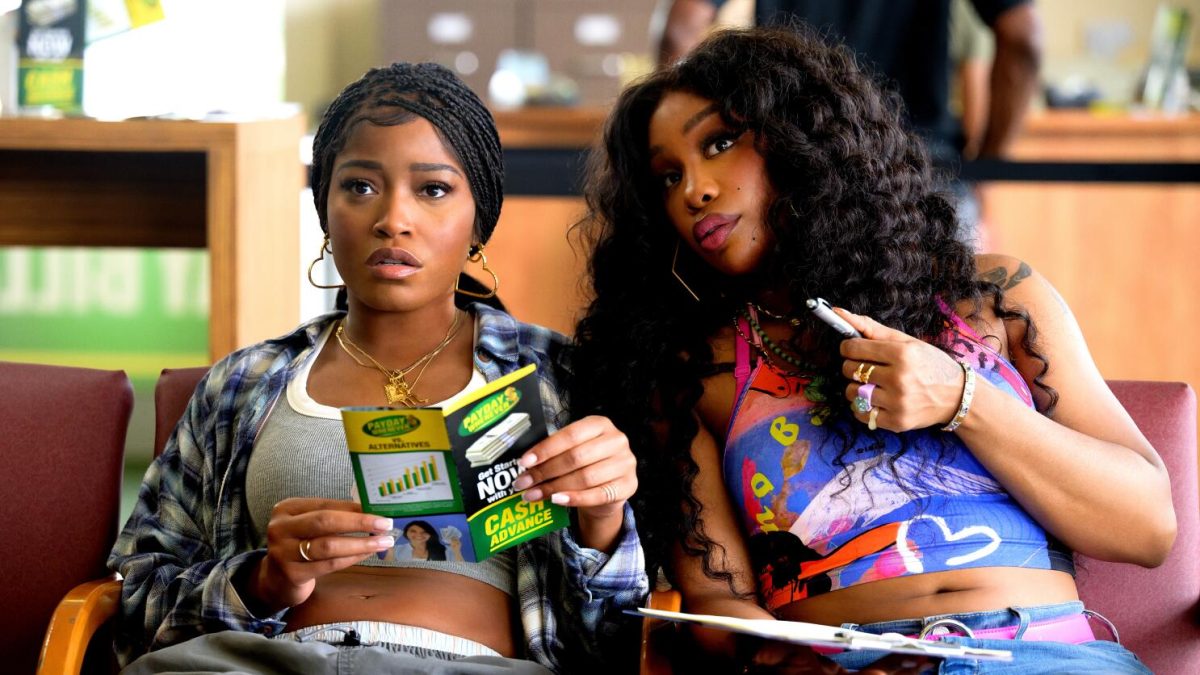 The Gayest Moments in One of Them Days: SZA points with a pen next to Keke Palmer in the waiting room at a payday loan place