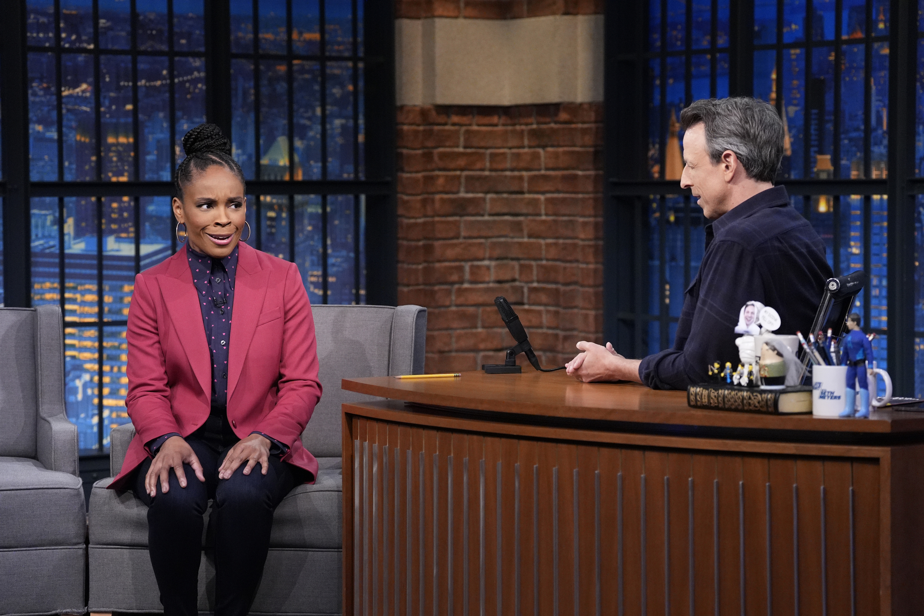 LATE NIGHT WITH SETH MEYERS -- Episode 1636 -- Pictured: (l-r) Amber Ruffin and Seth Meyers during the sketch "Both Sides" on Monday. March 31, 2025 -- (Photo by: Lloyd Bishop/NBC via Getty Images)