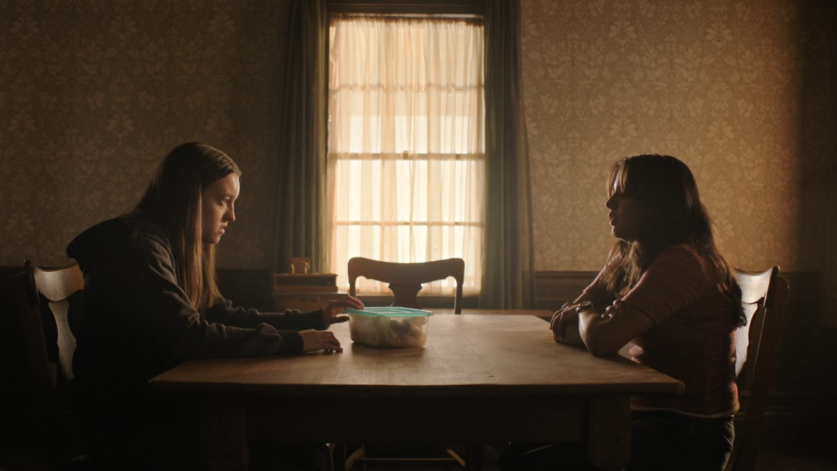 The Last of Us 203-3 ellie and dina at the dining room table in joel's house